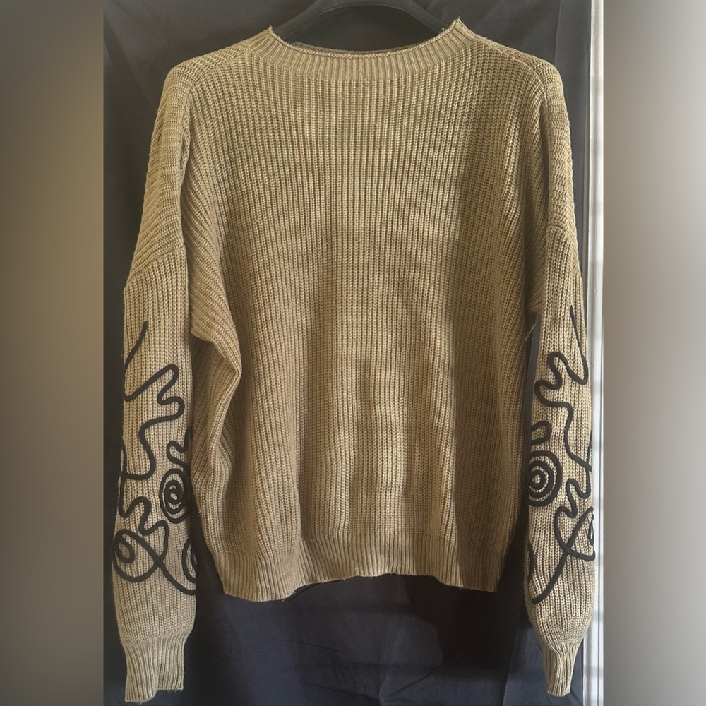 Beige Sweater with Black Abstract Design